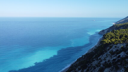 Fototapeta na wymiar The beautiful turquoise blue color of the Ionian Sea that surrounds the Greek island of Lefkada and Potro Katsiki beach