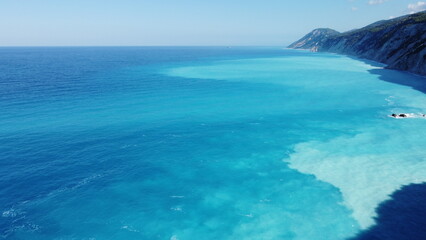 The beautiful turquoise blue color of the Ionian Sea that surrounds the Greek island of Lefkada and Potro Katsiki beach