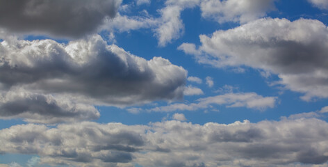 Blue Sky and Puffy Clouds