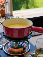 Traditional Cheese Fondue in a pot - Gruyere, Switzerland
