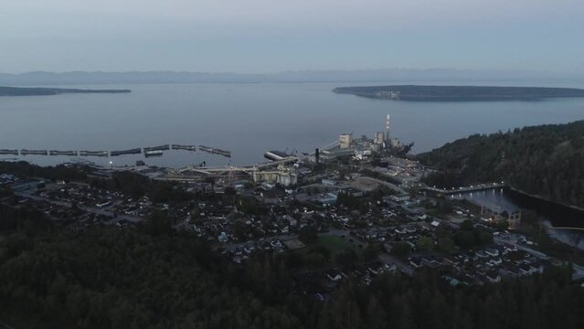 Aerial view of the Paper Mill cityscape on the coast of a lake in Canada