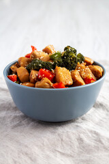 Homemade One-Pan Chicken And Broccoli Stir-Fry in a Bowl, side view.
