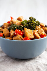 Homemade One-Pan Chicken And Broccoli Stir-Fry in a Bowl, side view.