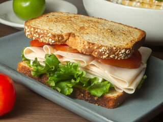 sandwich with ham and vegetables