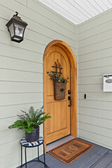 Wooden front door on porch