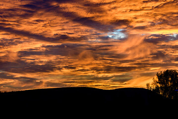 scenic view of dramatic sky during sunset