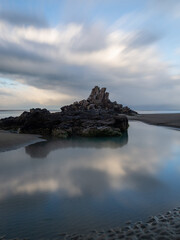 Day view of Shag Rock, Christchurh, New Zealand.