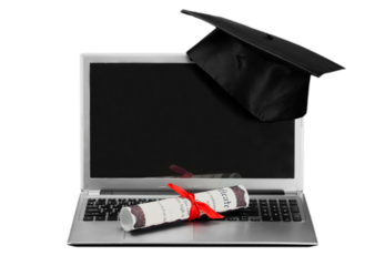 Laptop and diploma scroll and graduation hat