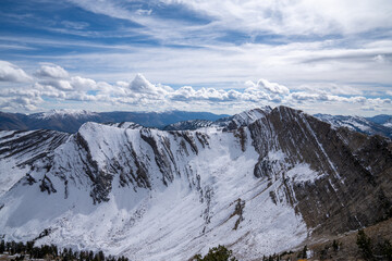Snowy mountain ridges in the Bridger-Teton National Forest of Wyoming, on a summit