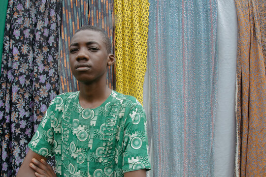Portrait of a boy in green native attire
