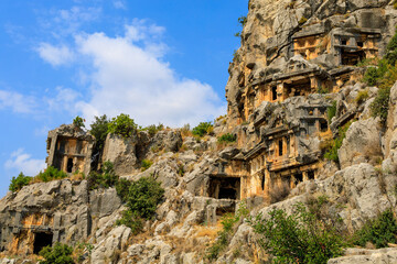 Fototapeta na wymiar Lycian rock tombs of the necropolis in Demre, the ancient city of Myra, one of the main centers of Lycia