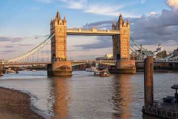 LONDON, UK - AUGUST 25, 2018:   Evening sunshine on Tower Bridge and the river Thames