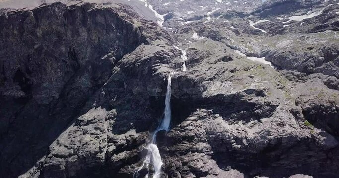 Aerial View of Large Swiss Waterfall in the Alps in Lenk, Switzerland