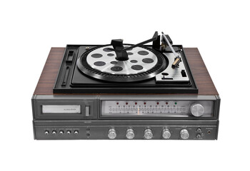 Vintage turntable stereo receiver with eight track tape player isolated.