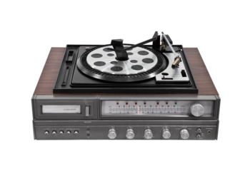 Vintage turntable stereo receiver with eight track tape player isolated.