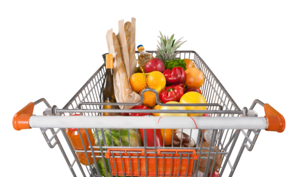 Shopping cart filled with various groceries in store