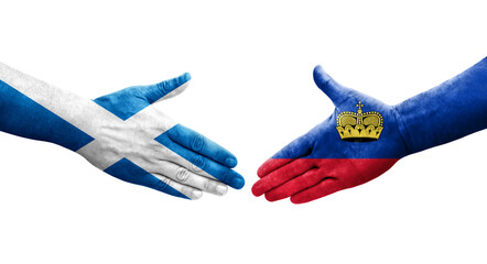 Handshake between Liechtenstein and Scotland flags painted on hands, isolated transparent image.