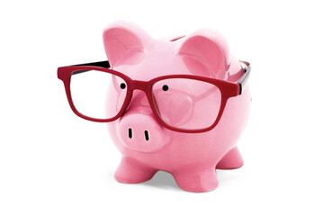 Piggy bank in glasses isolated on white