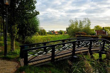 Netherland's Landscape of an authentic Holland or Dutch village in the distance. 