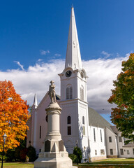 Manchester, VT - USA - Oct 9, 2022 Vertical image of the iconic Soldiers Monument, in front of the historic First Congregational Church, just north of the corner of Main Street and Union Street.