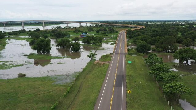 Flooding around the Bridge of Reconciliation that joins two banks of the Magdalena River in the department of Bolivar. Colombia.