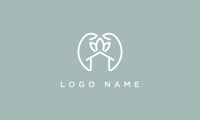 A line art icon logo of a house / home with a leaf circle and flower logo