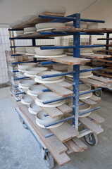 Pottery bowls drying in factory - 539597699