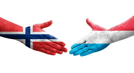 Handshake between Luxembourg and Norway flags painted on hands, isolated transparent image.