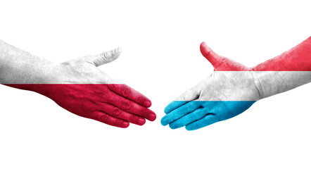 Handshake between Luxembourg and Poland flags painted on hands, isolated transparent image. - obrazy, fototapety, plakaty