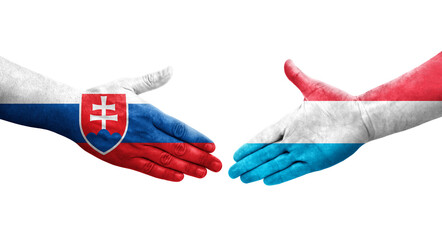 Handshake between Luxembourg and Slovakia flags painted on hands, isolated transparent image.