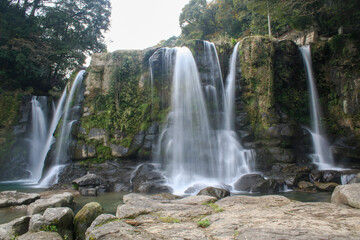 Fototapeta premium Long exposure of a waterfall in rural Japan