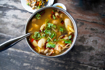 Thai spicy and sour fish soup in hot pot.