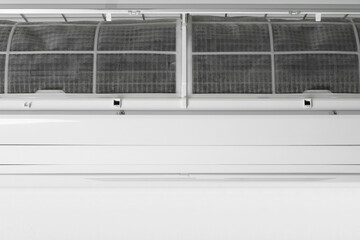 Modern air conditioner on white wall, closeup