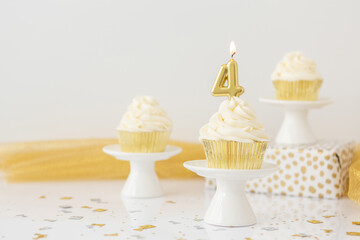 Birthday Candle 4 on Vanilla Cupcake