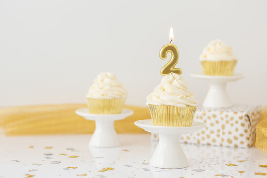 Birthday Candle 2 on Vanilla Cupcake
