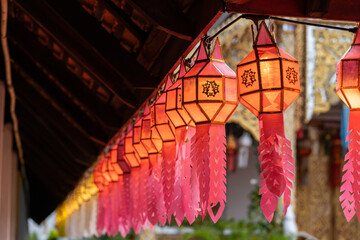 Colorful paper craft lantern festival at Wat Phra That Hariphunchai Lamphun Thailand.
