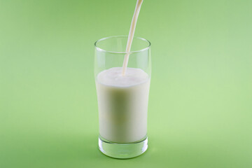 Pouring milk in the glass,Healthy Lifestyle