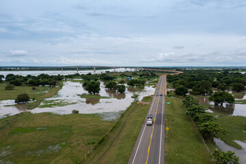 Flooding around the Bridge of Reconciliation that joins two banks of the Magdalena River in the department of Bolivar. Colombia.