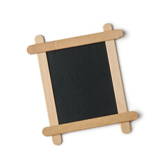 blank frame made of wooden ice cream sticks with black background, close-up of empty photo or text...