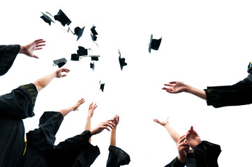 Graduating students hands throwing graduation caps on white background