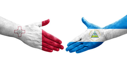 Handshake between Malta and Nicaragua flags painted on hands, isolated transparent image.