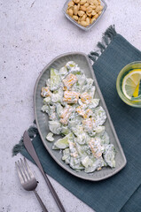 Raw vegetable salad with white sauce