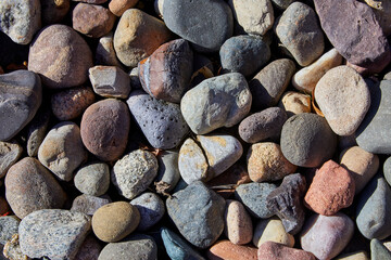 Rock background image of multi colored stones