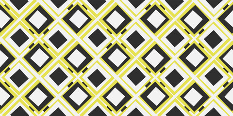 Yellow-black diamond-shaped surface seamless. Printing and decorating, stylish and simple rhombuses.