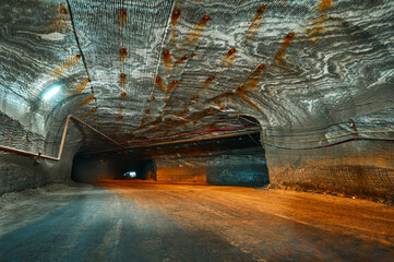 Empty tunnel with pipeline at sylvinite and abraum salt pit