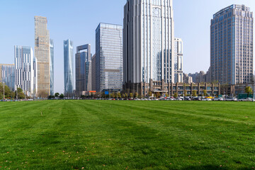 Obraz premium city park with modern building background in shanghai
