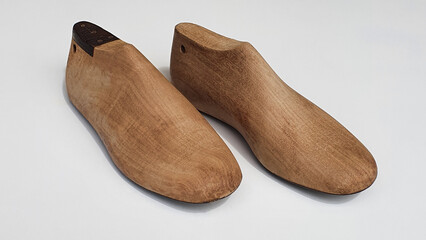 A pair of antique wooden shoe form used by shoemakers in the manufacture of shoes for adults and children. Modeling.
