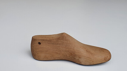 Old wooden shoe shape used by shoemakers in the manufacture of adult and children's shoes. Modeling.