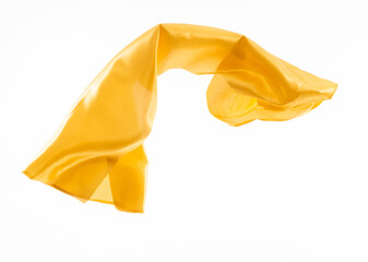 Yellow silk flying on white background