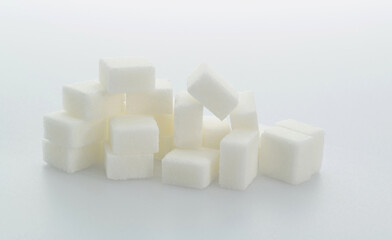 Group of sugar cubes on white background